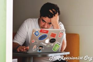stressed out guy working on a laptop with php apple github CSS NODE JS Stack Overflow logos